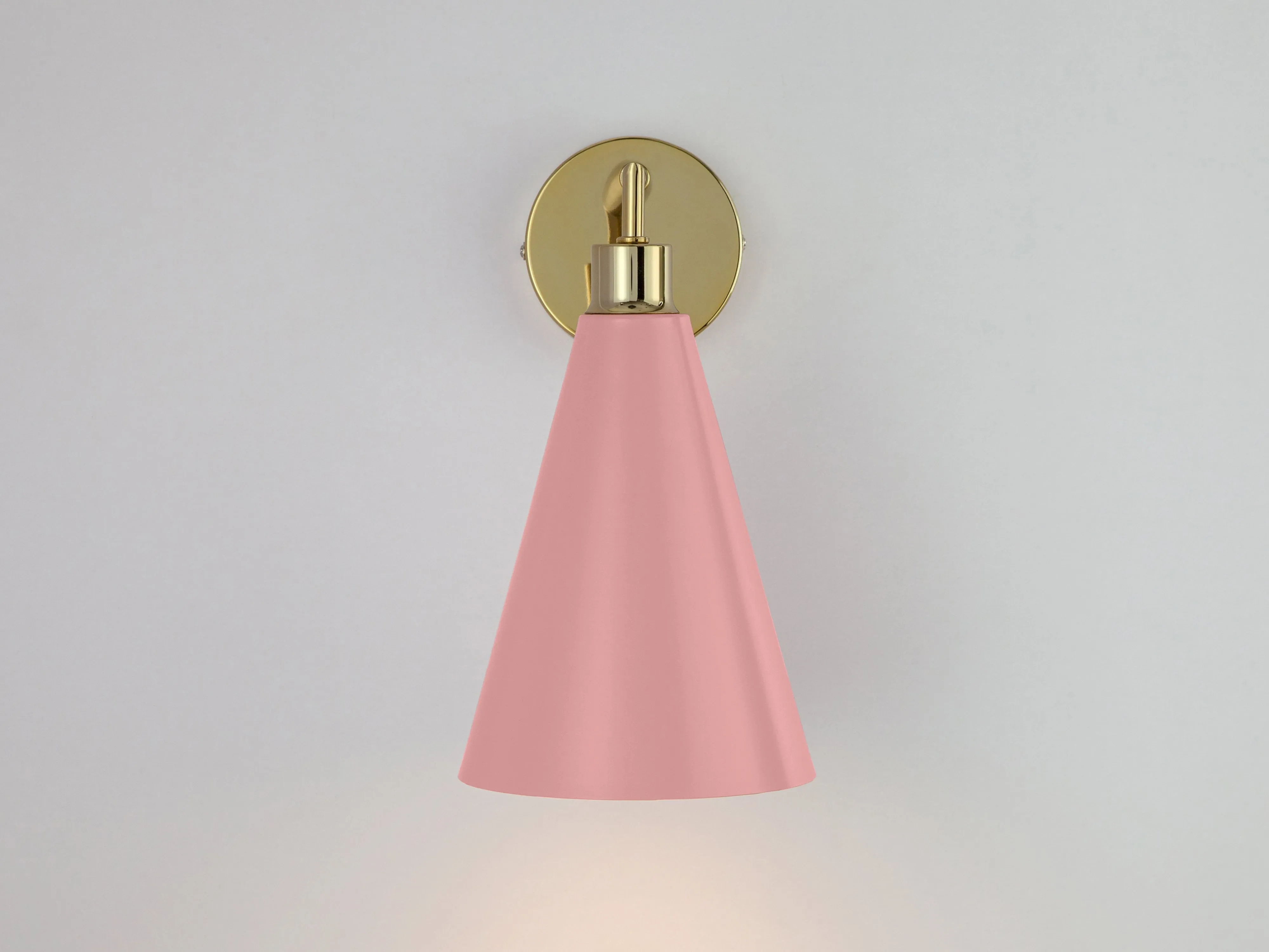 Pink cone shade wall light