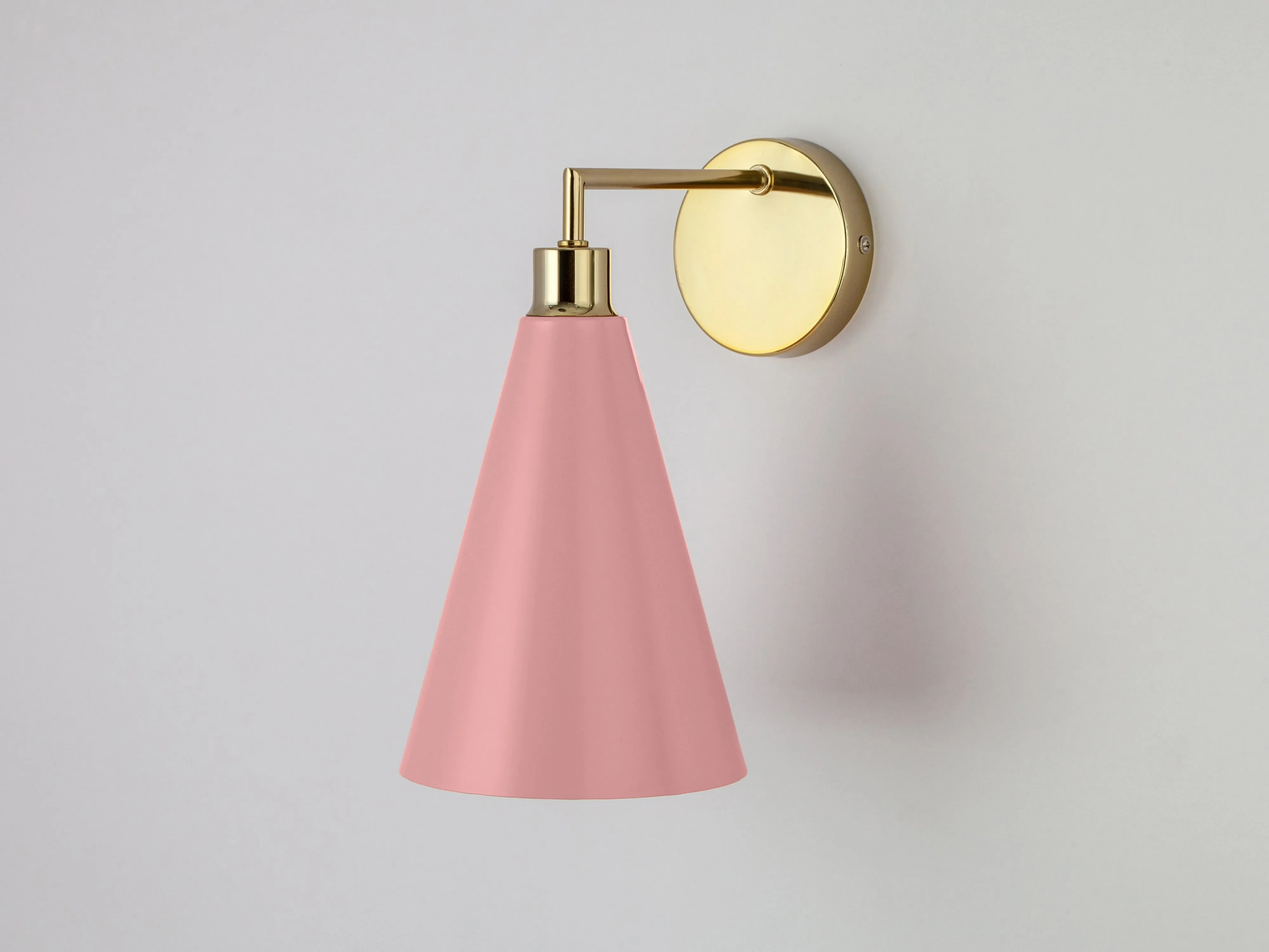 Pink cone shade wall light